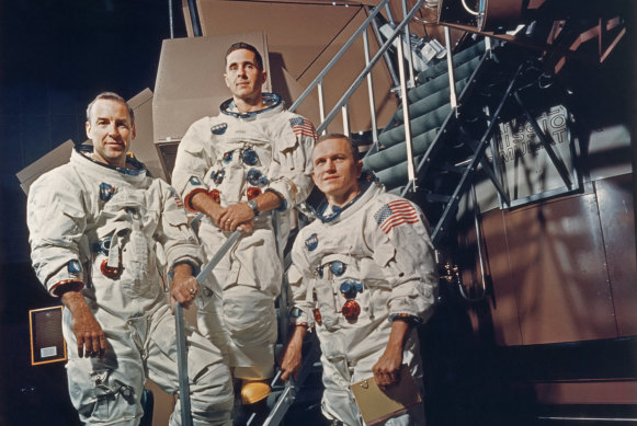 Apollo 8 crew James A. Lovell Jr, William A. Anders and Frank Borman in their space suits in 1968.