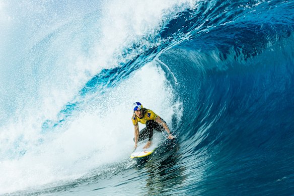 Molly Picklum in the thick of a Teahupo’o barrel.