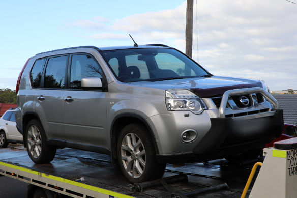 A Nissan X-TRAIL seized by police as part of their investigation.