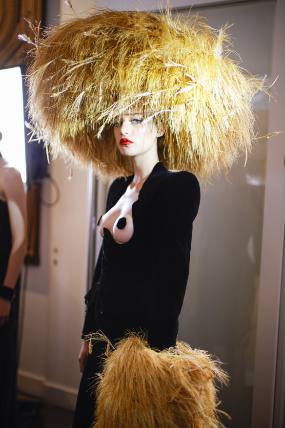 A model wears Schiaparelli couture for the autumn 2022 fashion show in Paris.