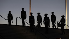 The Catafalque Party dismounts during the Anzac Day Dawn Service at the Australian War Memorial in Canberra.