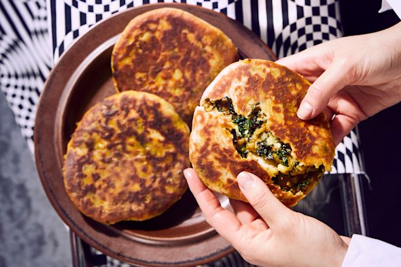 Filled flatbreads with kale and potato masala.