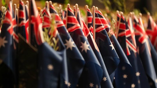 Australian flags ready for a citizenship ceremony at Melbourne Town Hall on Australia Day in 2023.