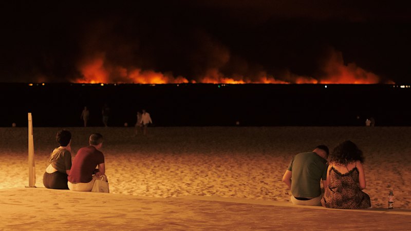 Wildfires threaten Bordeaux as more than 200,000 people flee flames in France, Spain