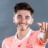 ADELAIDE, AUSTRALIA - NOVEMBER 15: Josh Cavallo poses in their coral strip during the Adelaide United A-League headshots session at Adelaide Entertainment Centre on November 15, 2021 in Adelaide, Australia. (Photo by Mark Brake/Getty Images for APL)