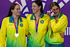 Silver medallist Alex Perkins, gold medallist Meg Harris and bronze medallist Shayna Jack.