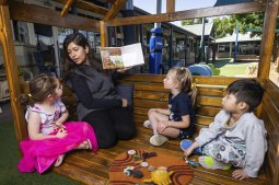 Flemington Goodstart Early Learning Centre director Mousumi Chowdhury with kinder kids (L-R) Estelle, 4, Victoria, 4 and Lucas, 4. Demand for kinder places in and around Melbourne is soaring.