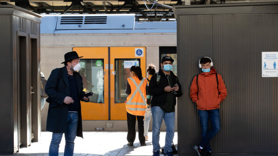 Passengers wear masks at Central Station, Sydney this week.