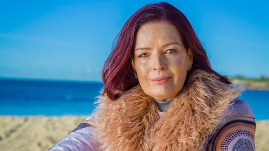 After starting a relationship with Stan Grant, Holmes says she had a “rude awakening” to the issues of race in Australia.