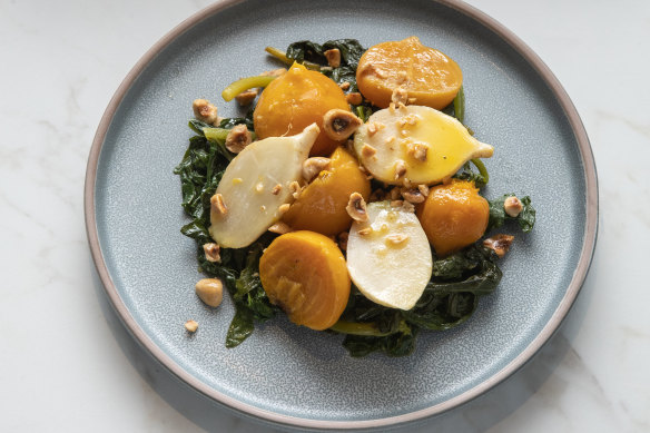 Turnip and beetroot are roasted to fudgy perfection then doused with crunchy hazelnuts, beet greens and garlic cloves.