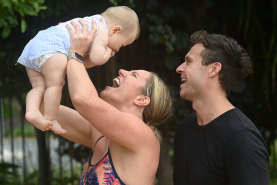 Emily Seebohm with her partner Ryan and son Sampson. 
