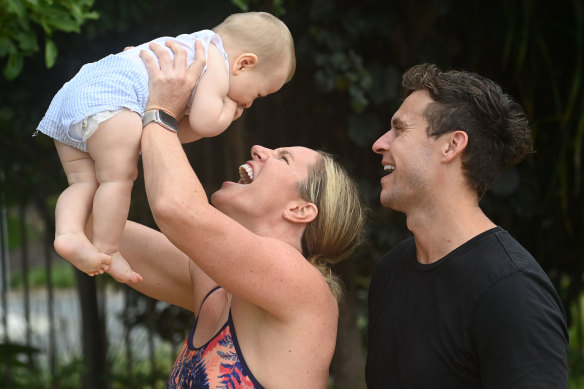Emily Seebohm with her partner Ryan and son Sampson. 
