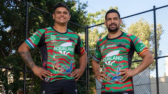 Latrell Mitchell and Cody Walker model the 2021 South Sydney Indigenous jersey.