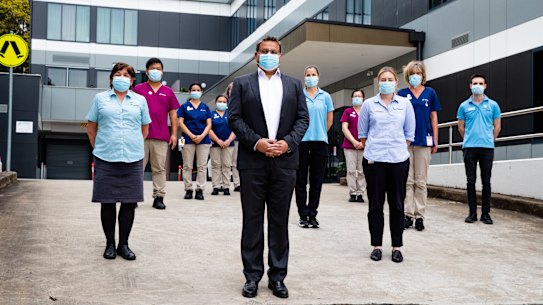 Dr Harry Pannu, CEO of Arcadia Pittwater rehabilitation hospital, with staff he says he will need to stand down if more private hospitals are not engaged to assist the pandemic effort.