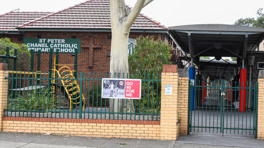 St Peter Chanel Primary School at Regents Park is one of two schools linked to a cluster of Omicron cases in south-west Sydney.