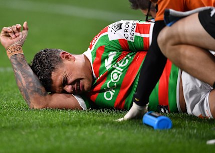 Rabbitohs fullback Latrell Mitchell goes down injured on Thursday night.