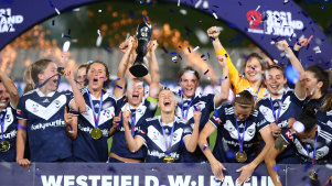 Oh so sweet: Melbourne Victory celebrate their title triumph.