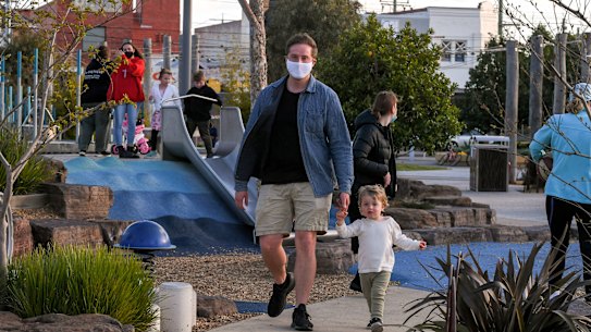 Kent Whalley and his son Heath at a busy Booran Reserve in Glen Huntly on Monday.