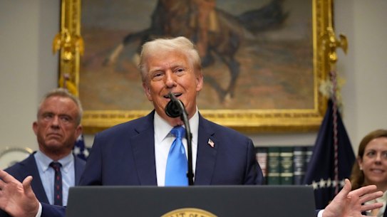 US President Donald Trump gives his views on autism as Health Secretary Robert F. Kennedy Jr watches.