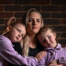 Joanna McNeill with daughters Matilda, 7, and Charlee, 5. The 36-year-old contracted silicosis after working in admin in a portable office at a quarry in Melbourne’s east. Most of the nation’s workplace health and safety ministers agreed in December to prohibit the use, supply and manufacture of engineered stone from July 2024, while Canberra vowed to ban imports from an unspecified date, in a deal celebrated by unions and health experts.