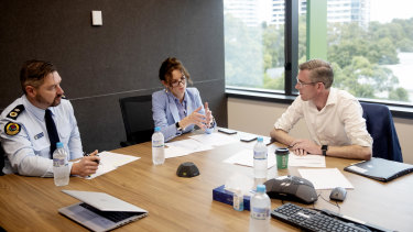 NSW SES Deputy Commissioner Damien Johnston, NSW Minister for Emergency Services and Resilience and Minister for Flood Recovery Steph Cooke, and NSW Premier Dominic Perrottet during a weather and flood update on Thursday. 