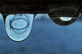 There has been cooler wet weather in Sydney after days of high temperatures and humidity.
Macro photo of a refracted image of the Sydney Harbour Bridge through a water drop.
taken on iPhone 13pro +
Photo Nick Moir 2 feb 2022