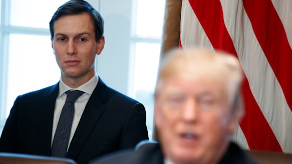 In the spotlight: White House senior adviser Jared Kushner listens as his father-in-law, President Donald Trump, addresses a cabinet meeting.