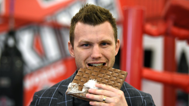 Choc chip: Jeff Horn wasn't happy to be dragged to Sydney by Anthony Mundine but did enjoy a snack his opponent is unable to have.