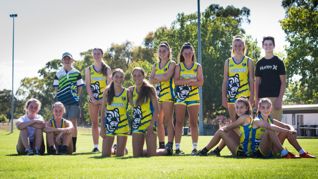 The under 15 girls Oztag team (with two of their brothers)  (front) Chloe and Nellie O’Donnell, Maddie and Ellie Hyland, Samantha and Kaylee Charlton, and (back) Cambell and Georgia Willey, Abbie and Samantha Bailey (all 14) with Sara and William Hannaford (15). 