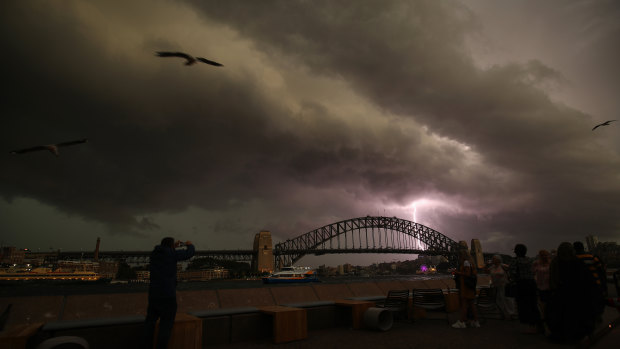 A lightning bolt strikes the Sydney Harbour Bridge.