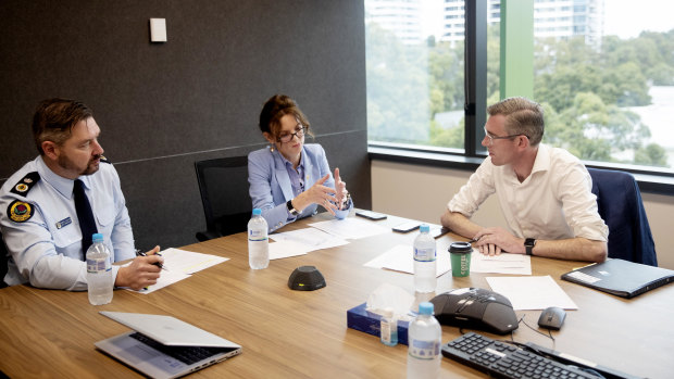 NSW SES Deputy Commissioner Damien Johnston, NSW Minister for Emergency Services and Resilience and Minister for Flood Recovery Steph Cooke, and NSW Premier Dominic Perrottet during a weather and flood update on Thursday. 