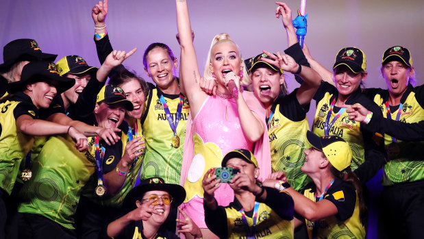 Katy Perry performs on stage with the Australian cricket team following their victory in the ICC Women's T20 cricket world cup final match against India.