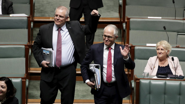 'Who is the Prime Minister?': Treasurer Scott Morrison and Prime Minister Malcolm Turnbull arrive for question time on Tuesday afternoon.