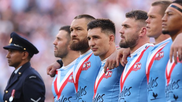 Victor Radley (centre) during the Last Post before the 2023 Anzac Day clash.