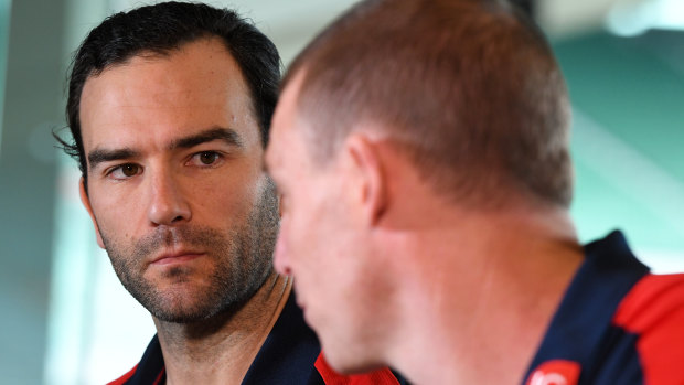 Jordan Lewis defended Dees coach Simon Goodwin at the press conference announcing Lewis' retirement on Tuesday.