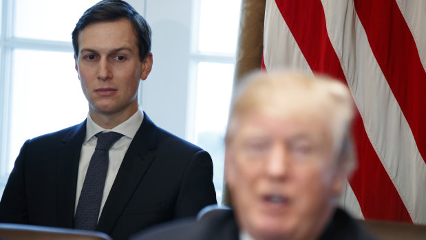 In the spotlight: White House senior adviser Jared Kushner listens as his father-in-law, President Donald Trump, addresses a cabinet meeting.