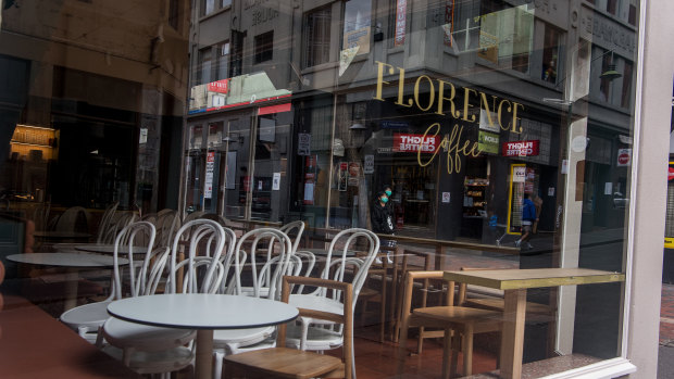 A Melbourne cafe closed due to the coronavirus outbreak. Women account for two-thirds of the staff in the heavily affected retail, hospitality and healthcare sectors.