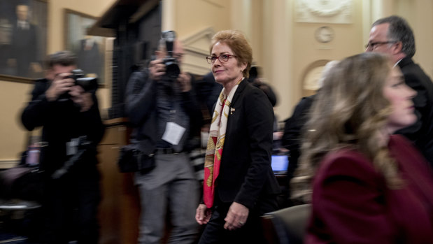 Marie Yovanovitch departs following her testimony to Trump's impeachment inquiry.
