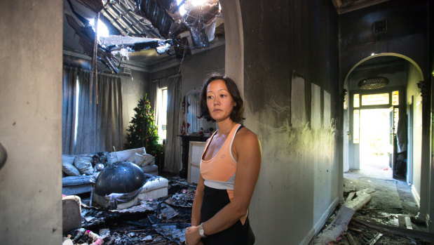 Sam Taylor inside her home which was destroyed by fire. 