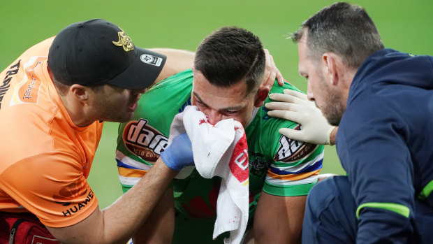 In doubt: Nick Cotric comes off injured  after accidentally copping a boot to the face.