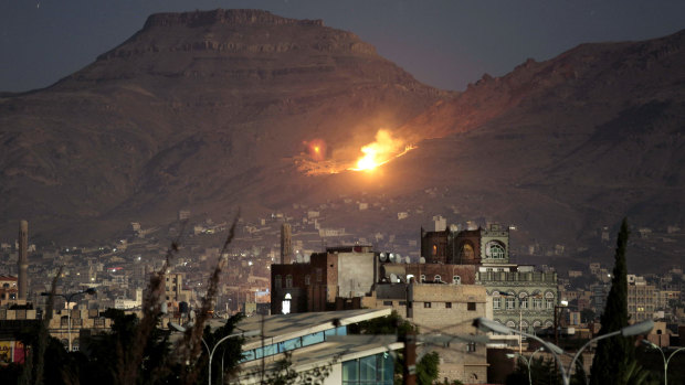 Fire and smoke rise after a Saudi-led airstrike hit a site believed to be one of the largest weapons depots on the outskirts of Yemen's capital, Sanaa in 2016. 