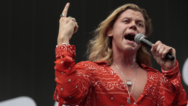 Conrad Sewell performing during Fire Fight Australia at Sydney's ANZ Stadium on February 16.