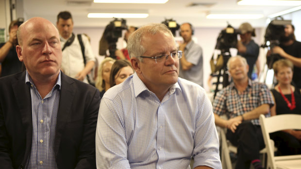 Prime Minister Scott Morrison (centre) with North Sydney MP Trent Zimmerman  at an announcement in Sydney on Sunday.