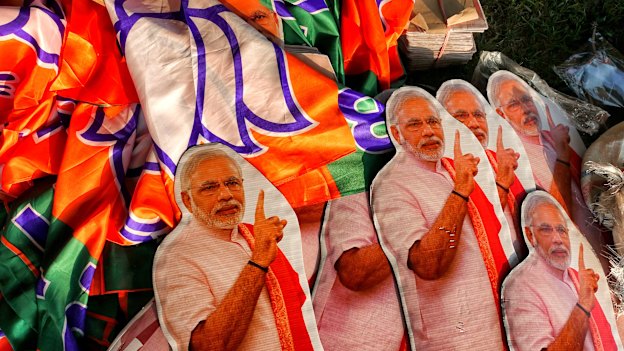 Cutouts of Modi before a rally in Kolkata.