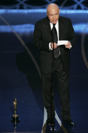 Actor Alan Arkin accepts the Oscar for best supporting actor.