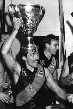 Tiger Dale Weightman with the premiership cup after Richmond's win.