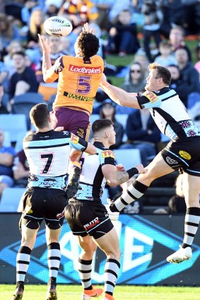 Xavier Coates provides a rare moment of brilliance in a sloppy game with this leap for a Broncos try.