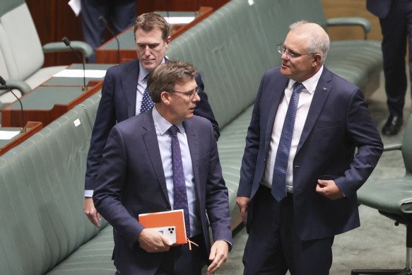 Former prime minister Scott Morrison, right, and former ministers Alan Tudge, centre, and Christian Porter, back left.