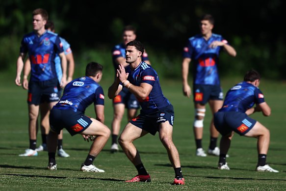 Nathan Cleary warming up before NSW trained at Somerset College on the Gold Coast on Saturday.