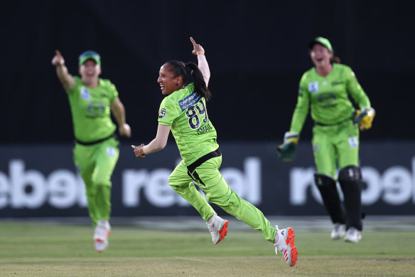 Shabnim Ismail celebrates after taking the key wicket of Meg Lanning.